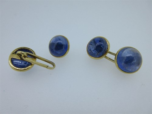 Lot 403 - A pair of French 18ct gold and sapphire double ended cufflinks