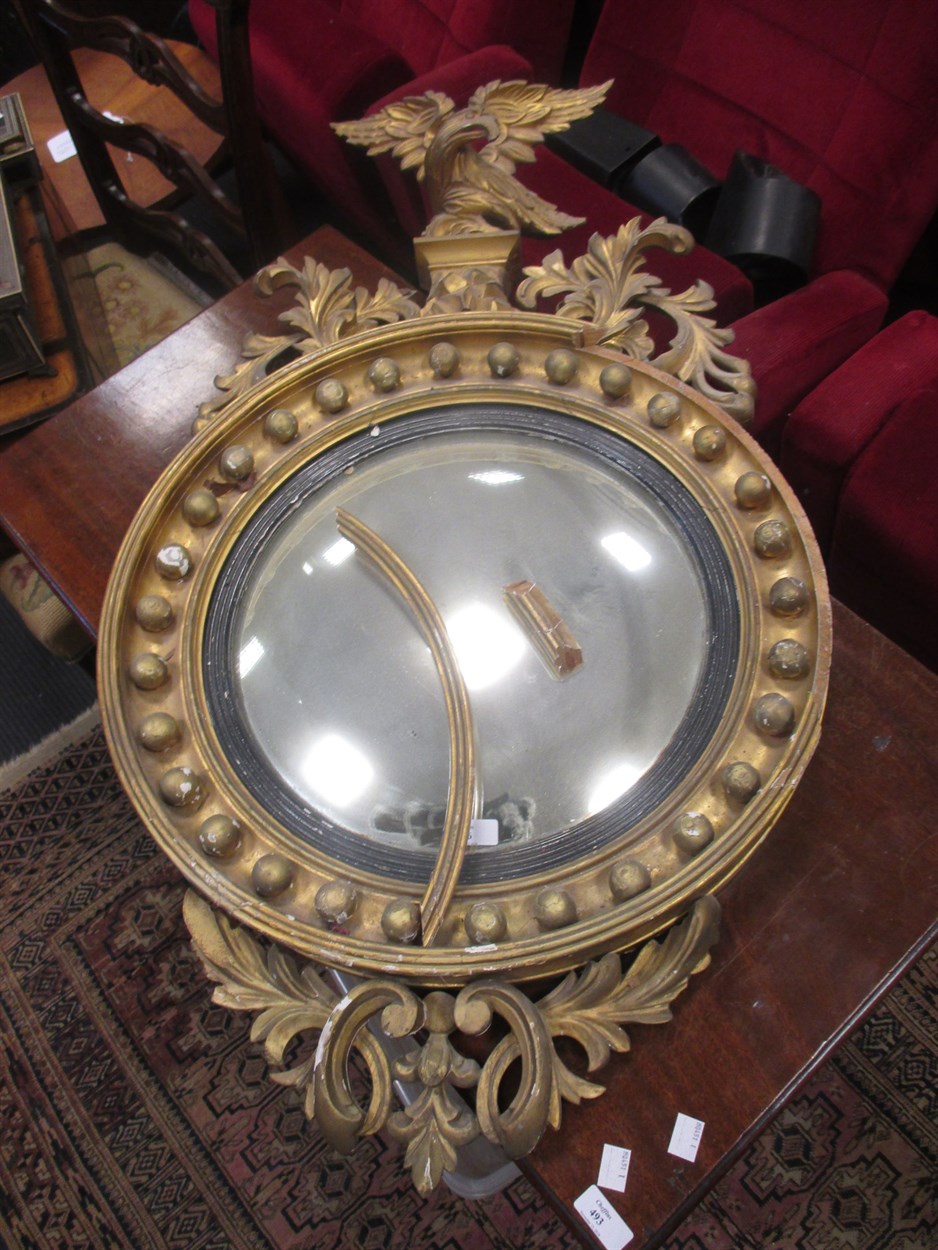 Lot 556 - A 19th Century convex mirror with Eagle...