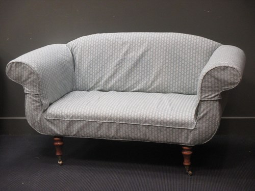 Lot 488 - A Victorian style scroll armed two-seater...