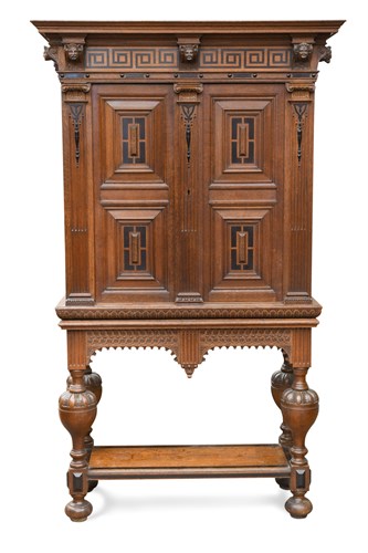 Lot 325 - A 17th century style Continental oak cabinet on stand