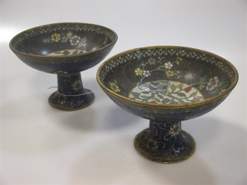 Lot 72 - A pair of cloissone tazzas in the forms of...
