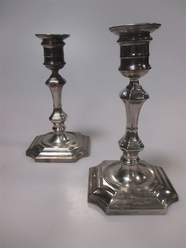 Lot 232 - A pair of silver dwarf candlesticks, London 1935