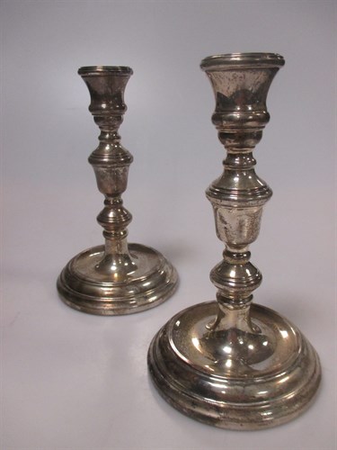 Lot 236 - A pair of modern silver dwarf candlesticks