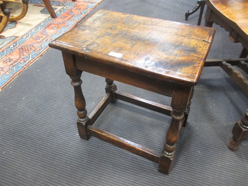 Lot 485 - A 19th century oak stool
