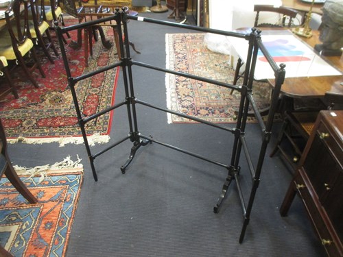 Lot 407 - A Victorian ebonised towel rail and papier...