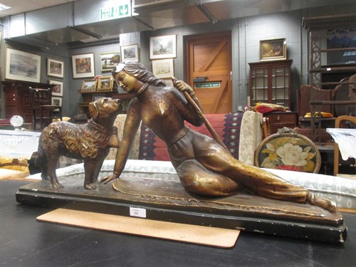 Lot 102 - An Art Deco painted plaster model of a female...