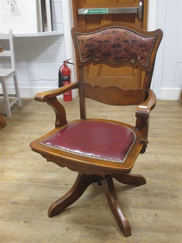 Lot 539 - An Art Nouveau ash and oak office armchair
