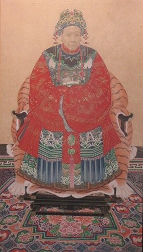 Lot 382 - A Chinese ancestral portrait, the sitter...