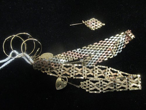 Lot 157 - Two 9ct gold bracelets, three 9ct gold rings,...