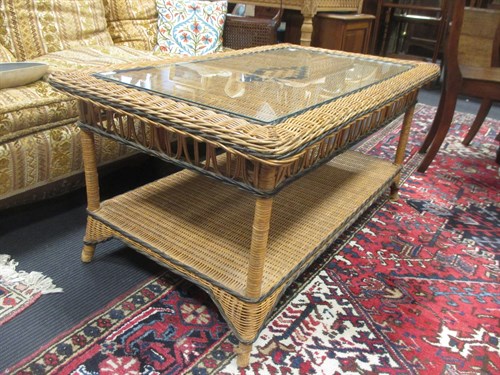Lot 525 - A Liberty & Co canework coffee table with...