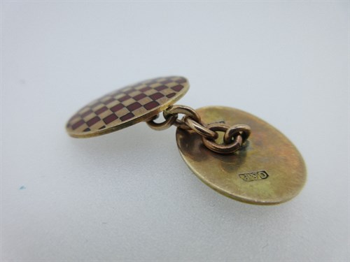 Lot 246 - A pair of 9ct gold and enamel cufflinks by Cropp & Farr