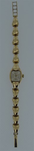 Lot 176 - Imaco & Rolex - A lady's 9ct gold wristwatch