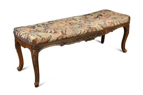 Lot 398 - A Louis XV style carved oak stool