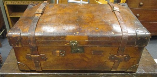 Lot 375 - A leather and brass studded luggage case...