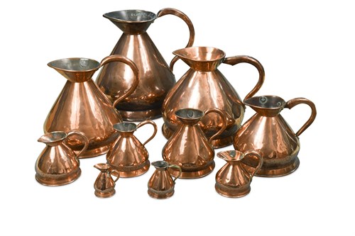 Lot 220 - A Graduated group of ten 19th century copper measuring harvest jugs