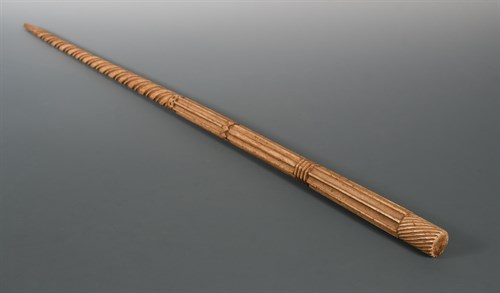 Lot 230 - An early 19th century carved whale bone walking cane