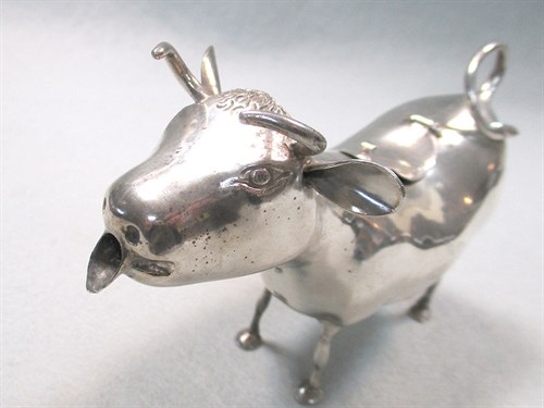 Lot 6 - A Victorian silver Schuppe style cow creamer