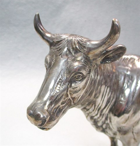 Lot 7 - A German oversized naturalistic cow creamer