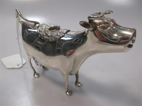 Lot 153 - A continental silver cow creamer, possibly...