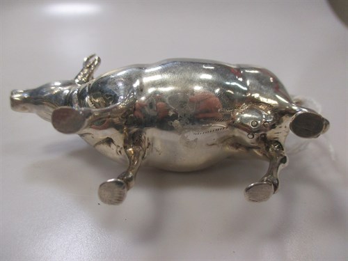 Lot 228 - A Continental silver cow creamer with hinged...