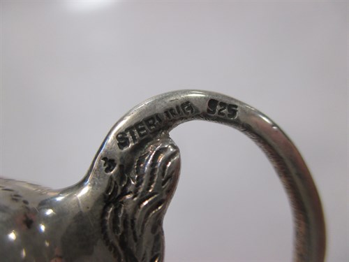 Lot 228 - A Continental silver cow creamer with hinged...