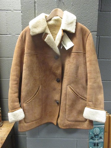 Lot 427 - A ladies full length fur coat, and two sheep...
