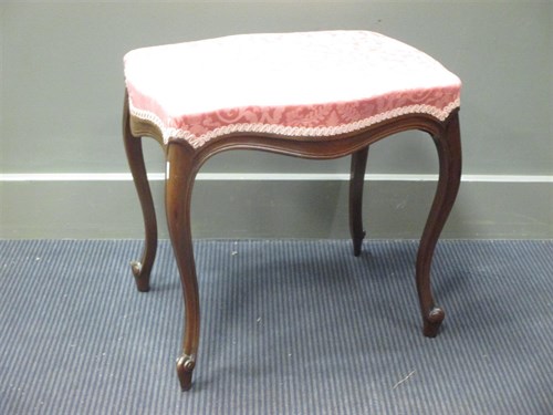 Lot 365 - A 19th century upholstered stool, on carved...