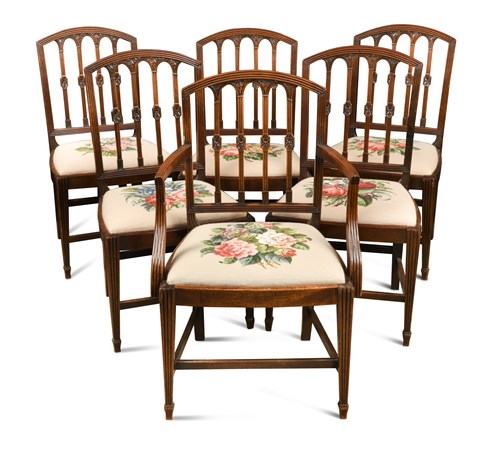 Lot 335 - A set of seven Regency mahogany rail back dining chairs