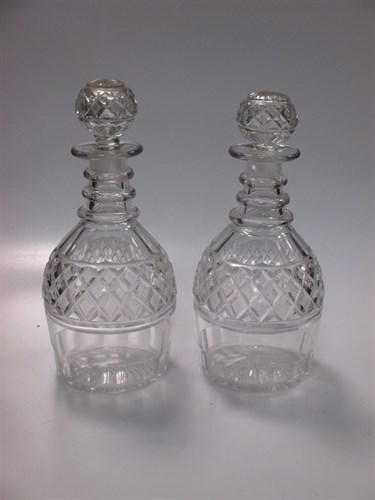 Lot 20 - A pair of Regency cut glass ring neck...