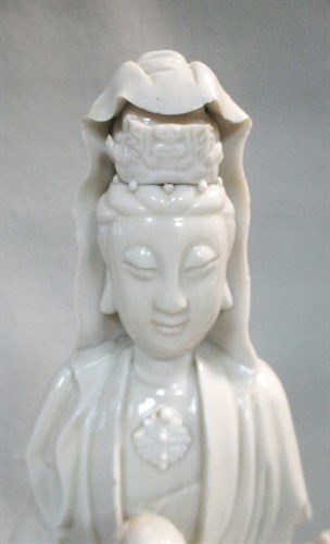 Lot 94 - A large figure of Dehua Guanyin and her attendants, 18th or19th century