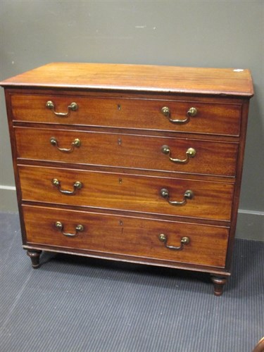Lot 300 - A George III mahogany chest of four long...