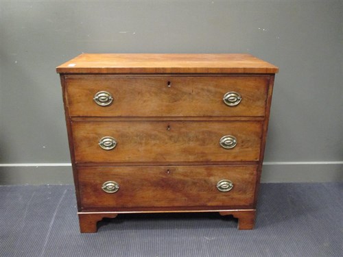 Lot 366 - A 19th century mahogany chest of three long...