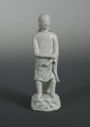 Lot 93 - A Blanc de Chine figure of Adam, Kangxi period