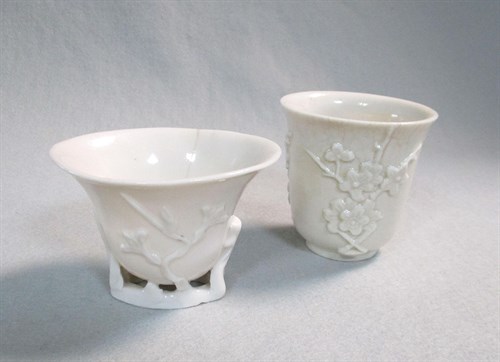 Lot 100 - A Blanc de Chine libation cup and a beaker, Kangxi period