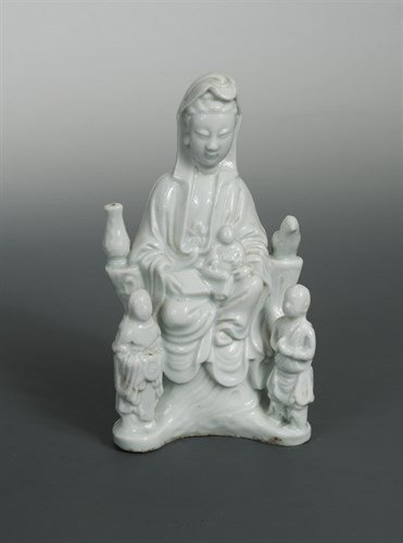 Lot 103 - A Dehua Guanyin with her a child and acolytes, Qing dynasty