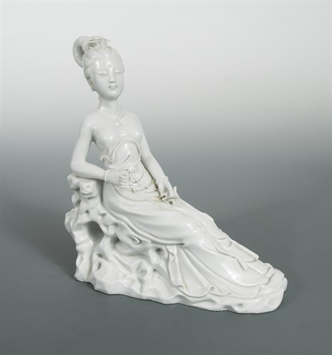 Lot 135 - A Dehua sculpture of a lady, 20th century