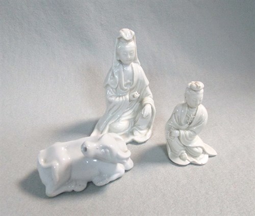 Lot 107 - Two Dehua Guanyin and a buffalo, Qing dynasty and later