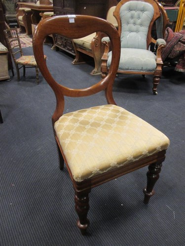 Lot 294 - A set of eight mahogany balloon back dining...