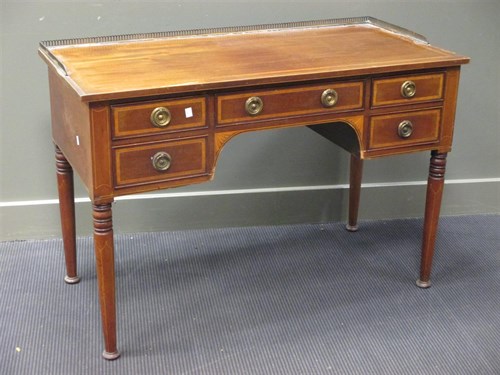 Lot 278 - An Edwardian mahogany kneehole dressing table...