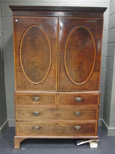 Lot 333 - A George III mahogany linen press, with...