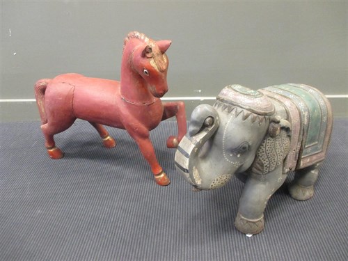 Lot 78 - A large carved and painted Indian elephant and...