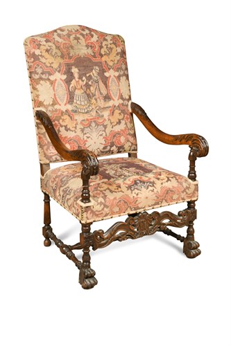 Lot 312 - A 17th century Italian style carved oak framed armchair