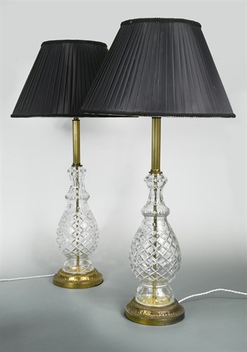 Lot 198 - A pair of cut glass table lamps