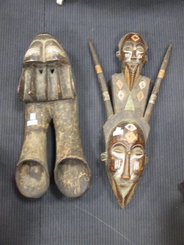 Lot 77 - Two African tribal masks, 66cm high and 58cm high