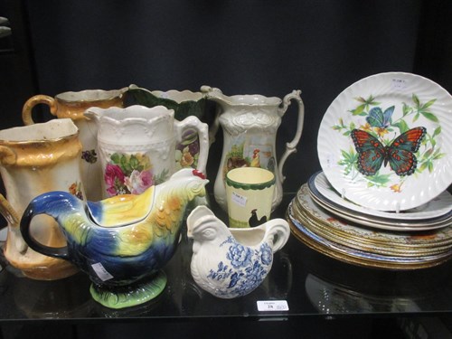 Lot 28 - Floral jugs and teapots together with vintage...