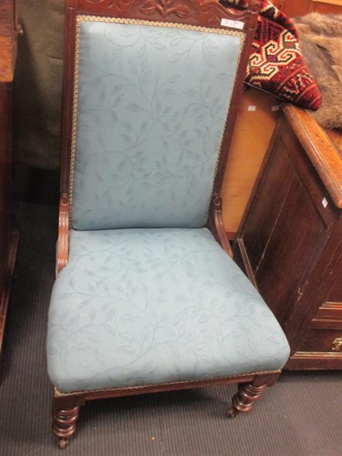 Lot 322 - A late Victorian upholstered armchair on...
