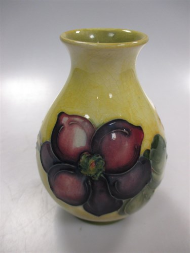 Lot 16 - A Moorcroft vase, the yellow ground with...