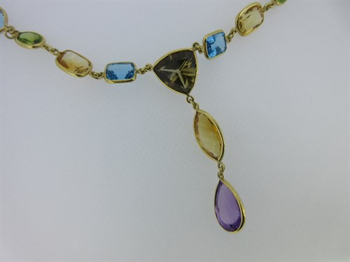 Lot 204 - A multi gem set statement necklace and bracelet en suite