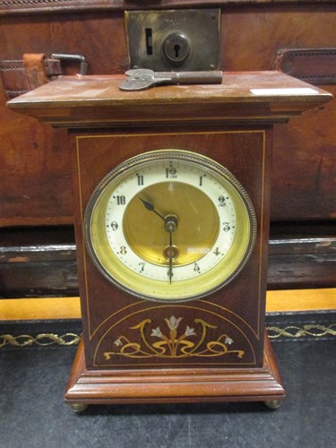 Lot 364 - An Art Nouveau inlaid mahogany mantle clock,...