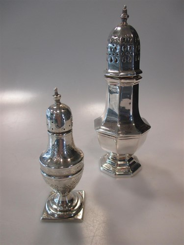 Lot 147 - A silver sugar caster and a silver pepper (2)...